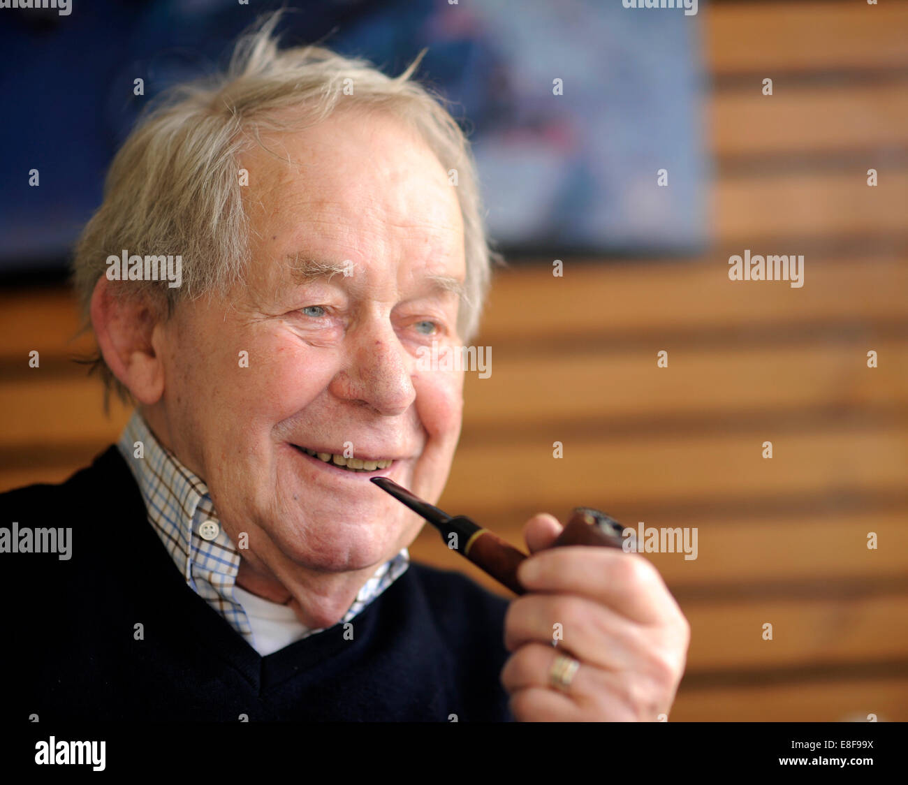 (FILE) - An archive picture, dated 08 February 2011, shows author Siegfried Lenz smoking his pipe during a DPA interview in Hamburg, Germany. As informed by the publishing agency 'Hoffmann und Campe', the author of significant German post-war literature died on 07 October 2014. PHOTO:FABIAN BIMMER/DPA Stock Photo