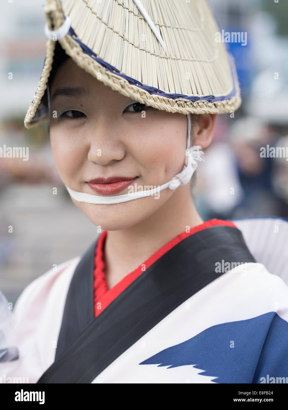 Woman in traditional straw hat at Awa Odori ( Awa Dance Festival ) held 12 ...