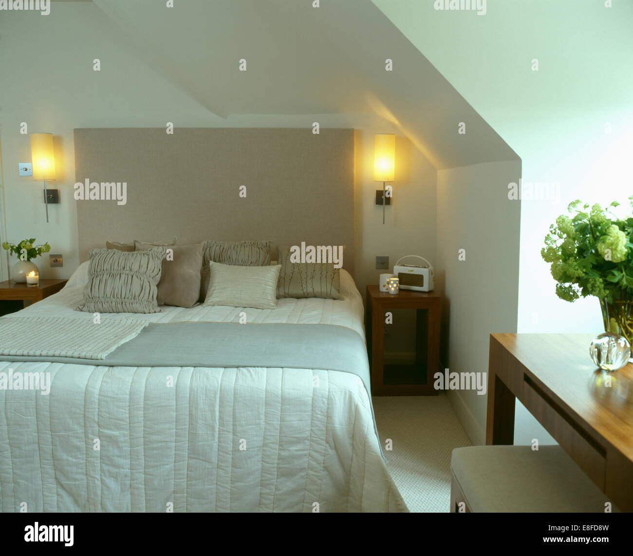 Lighted Wall Lights On Either Side Of Bed With Upholstered Head