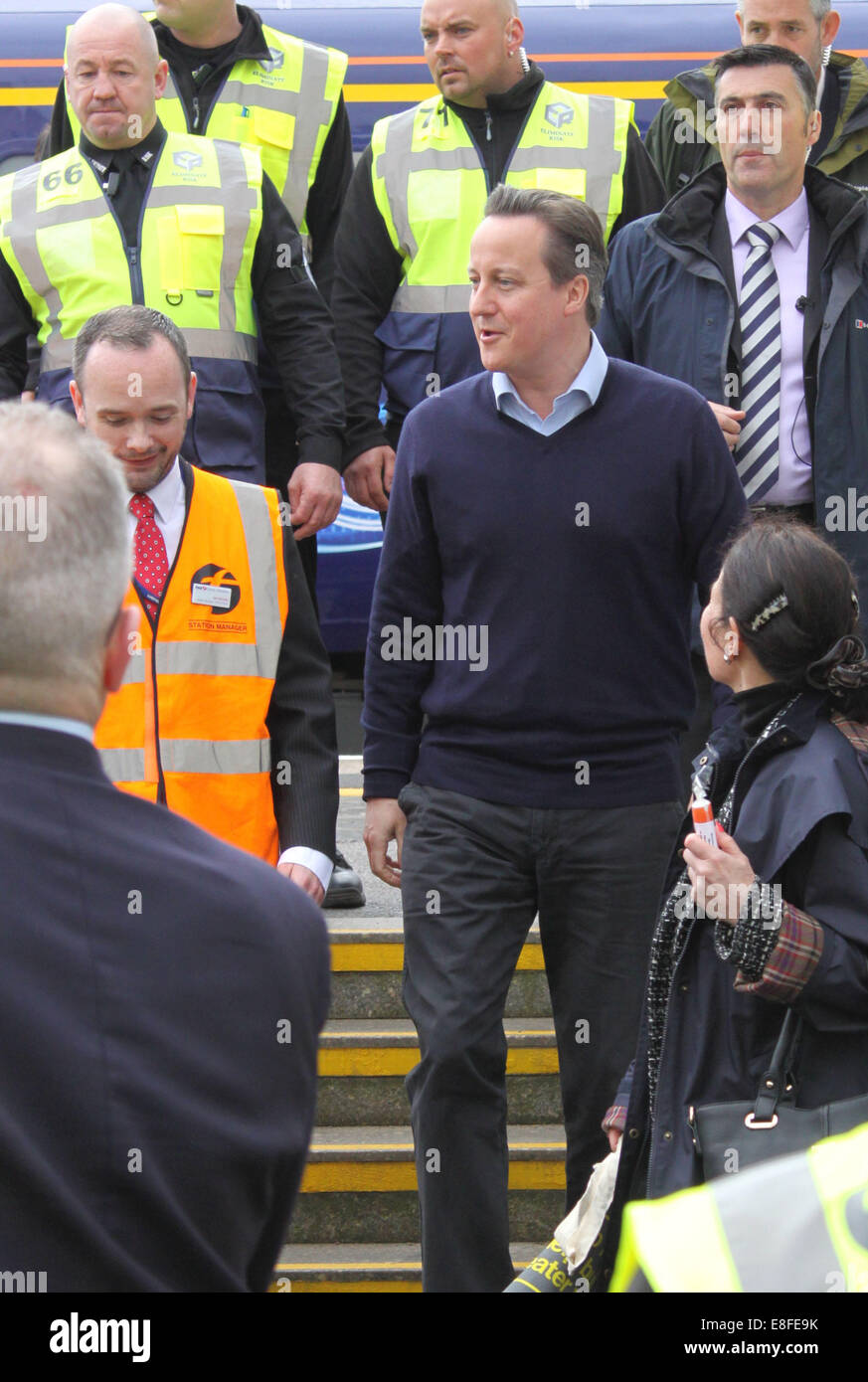 Prime Minister David Cameron visits Dawlish train station for the grand re-opening after the station was closed in February due to storm damage. Mr Cameron spoke to several members of public and rail staff, thanking all the workers on their hard efforts in getting the railway repaired in such a short period of time Featuring: David Cameron Where: Dawlish, Devon, United Kingdom When: 04 Apr 2014 Stock Photo