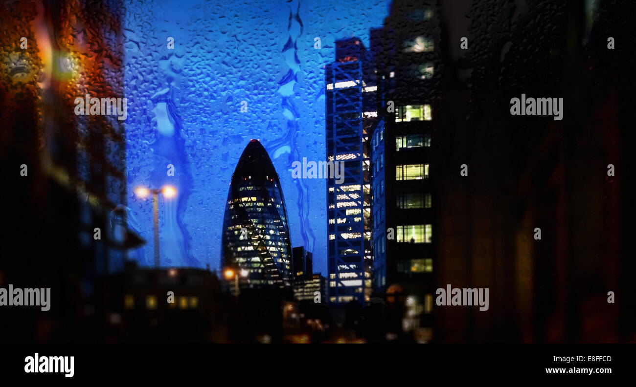 UK, London, Cityscape with Gherkin at dusk Stock Photo
