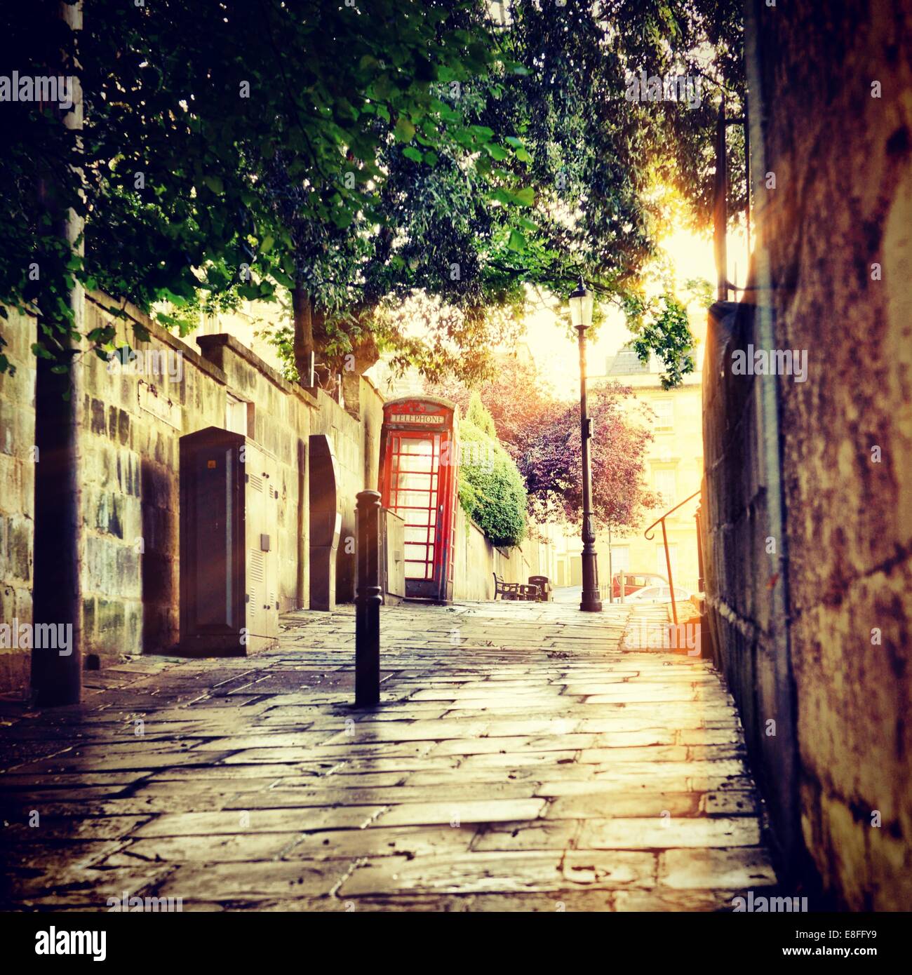 View of wet city street, England, United Kingdom Stock Photo