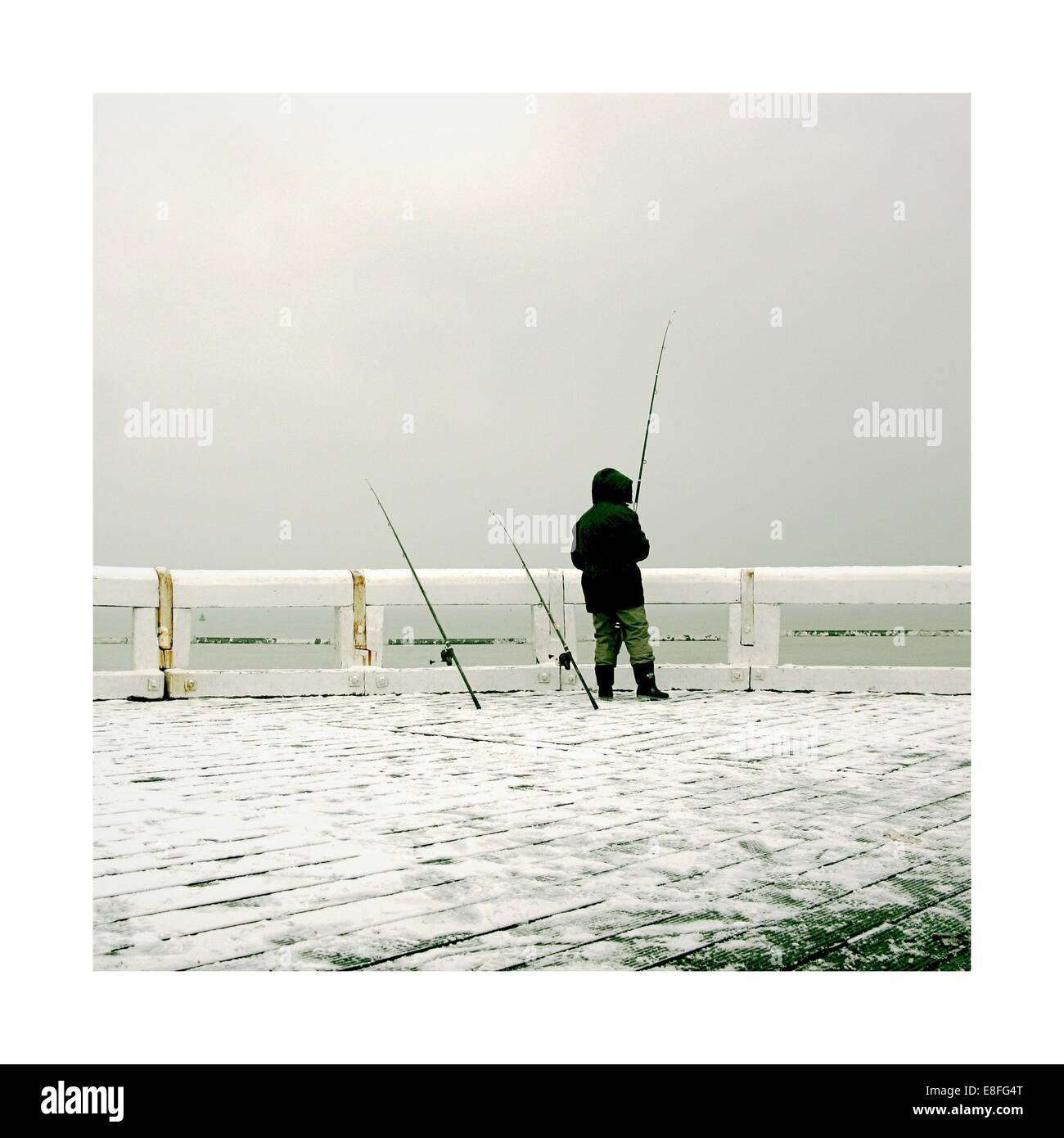 Man standing fishing Cut Out Stock Images & Pictures - Alamy