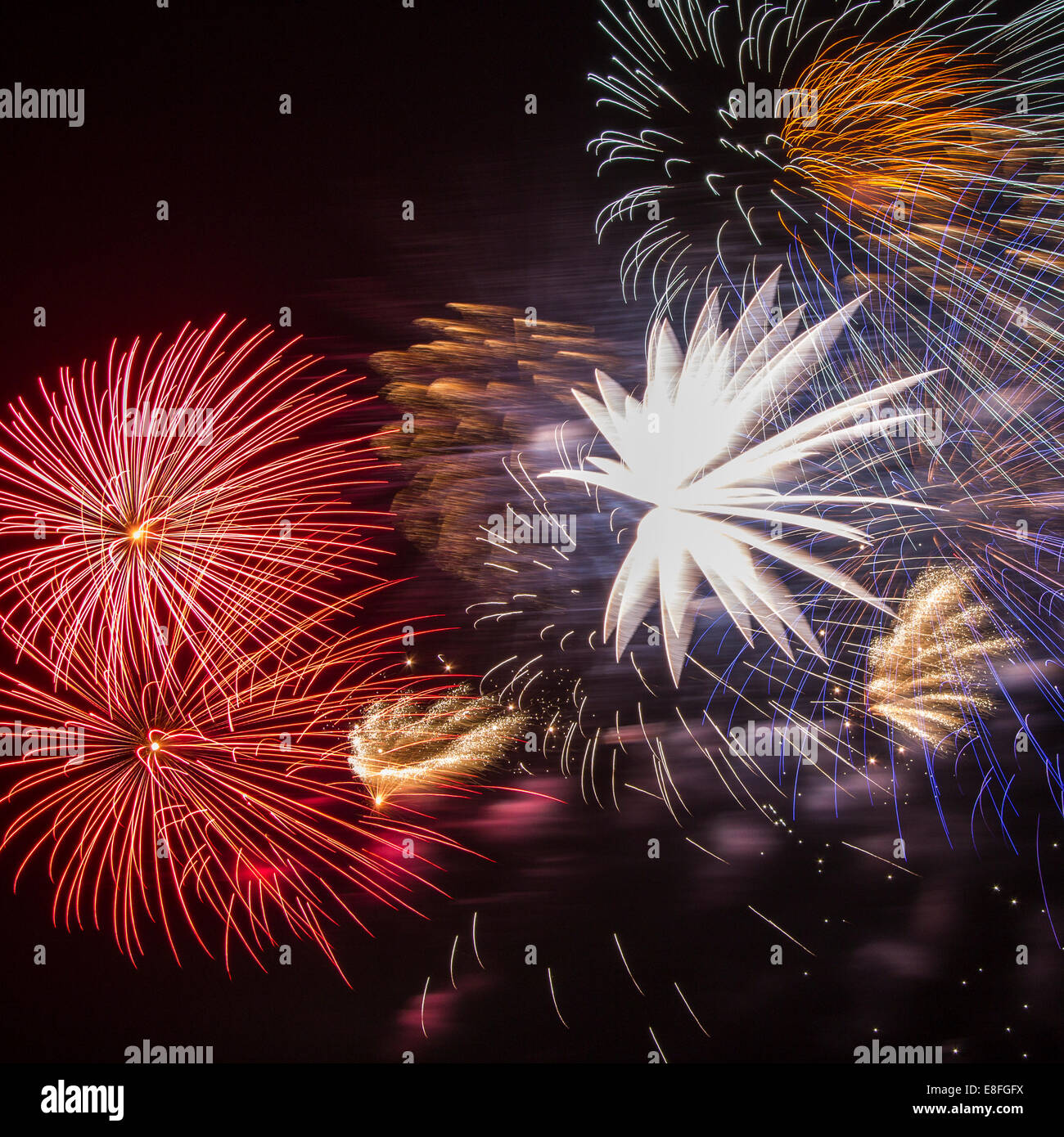 Colorful fireworks in night sky Stock Photo