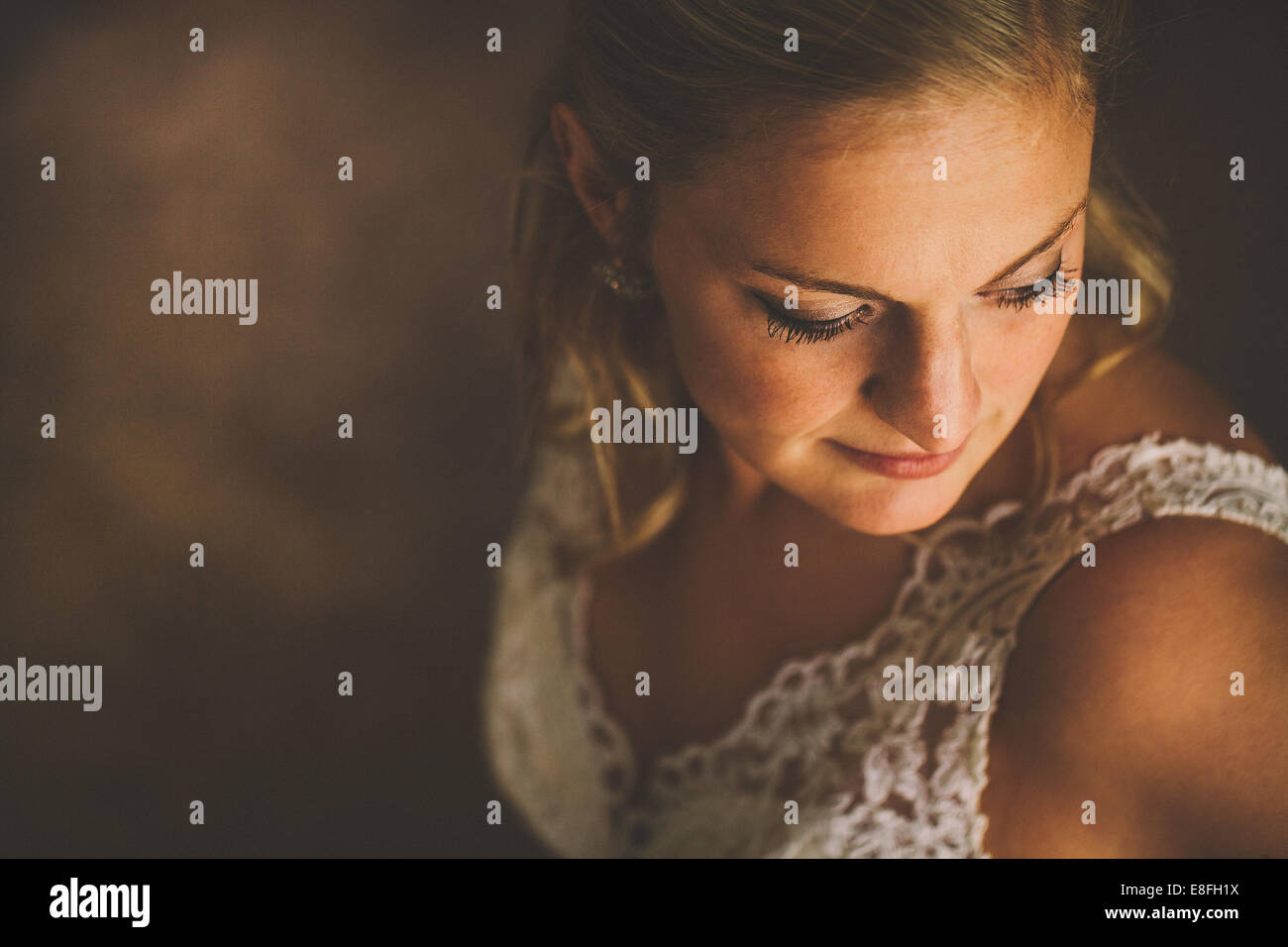 Close-up portrait of a bride looking over her shoulder Stock Photo