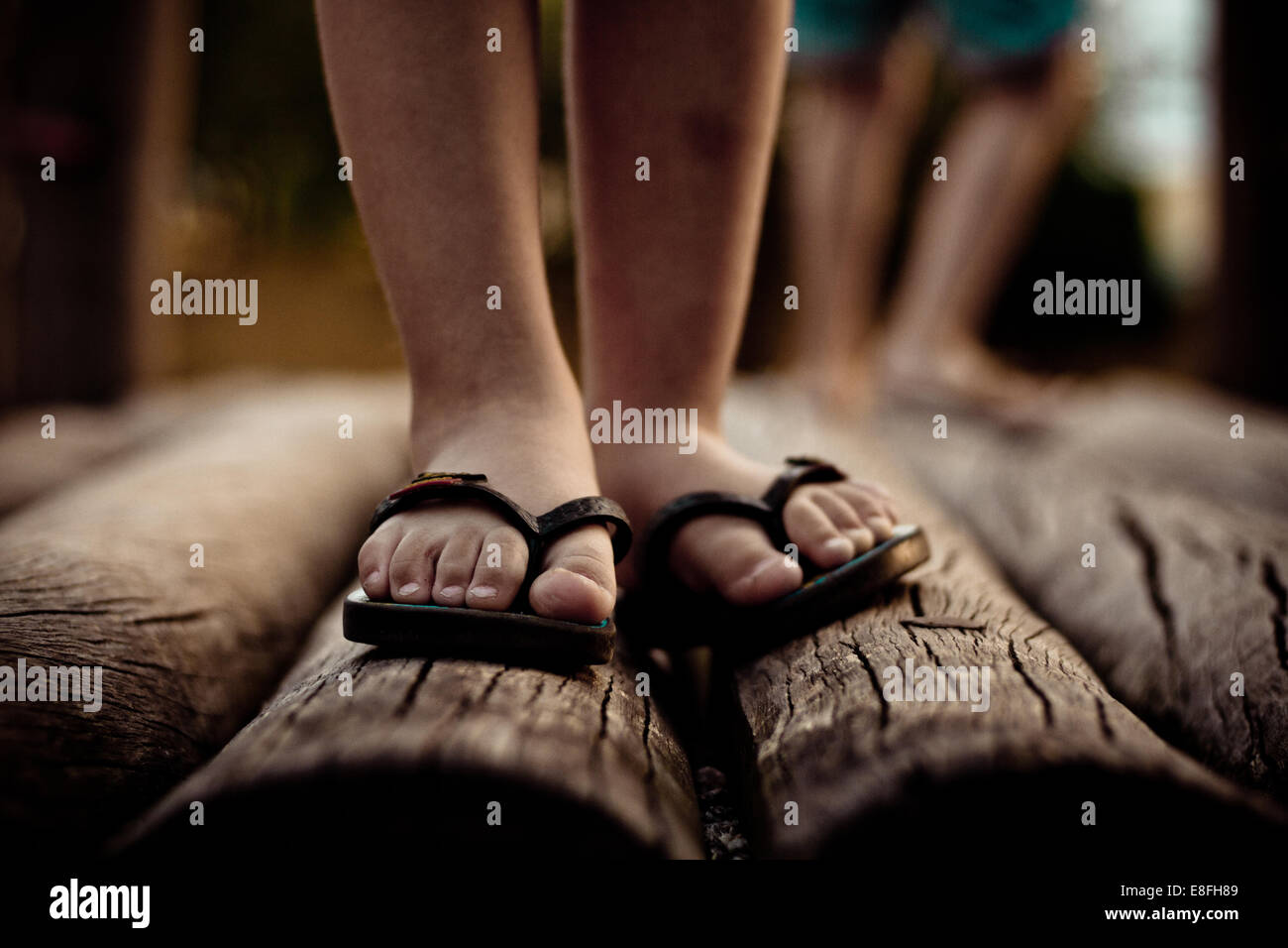 View boys feet in flip flops hi-res stock photography and images - Alamy