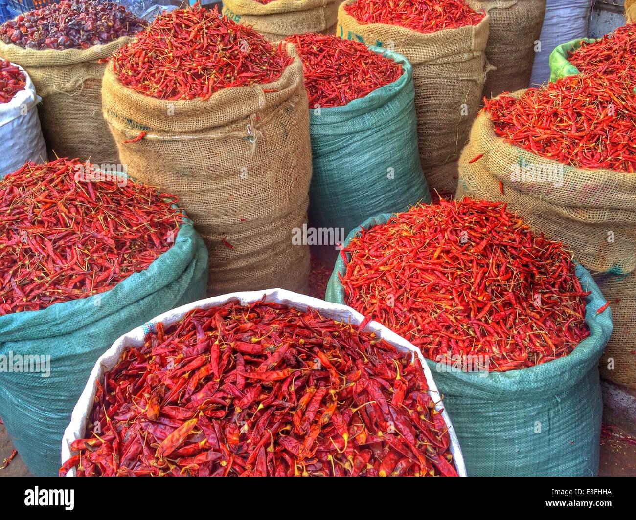 Sacks of chili peppers in market, India Stock Photo Alamy