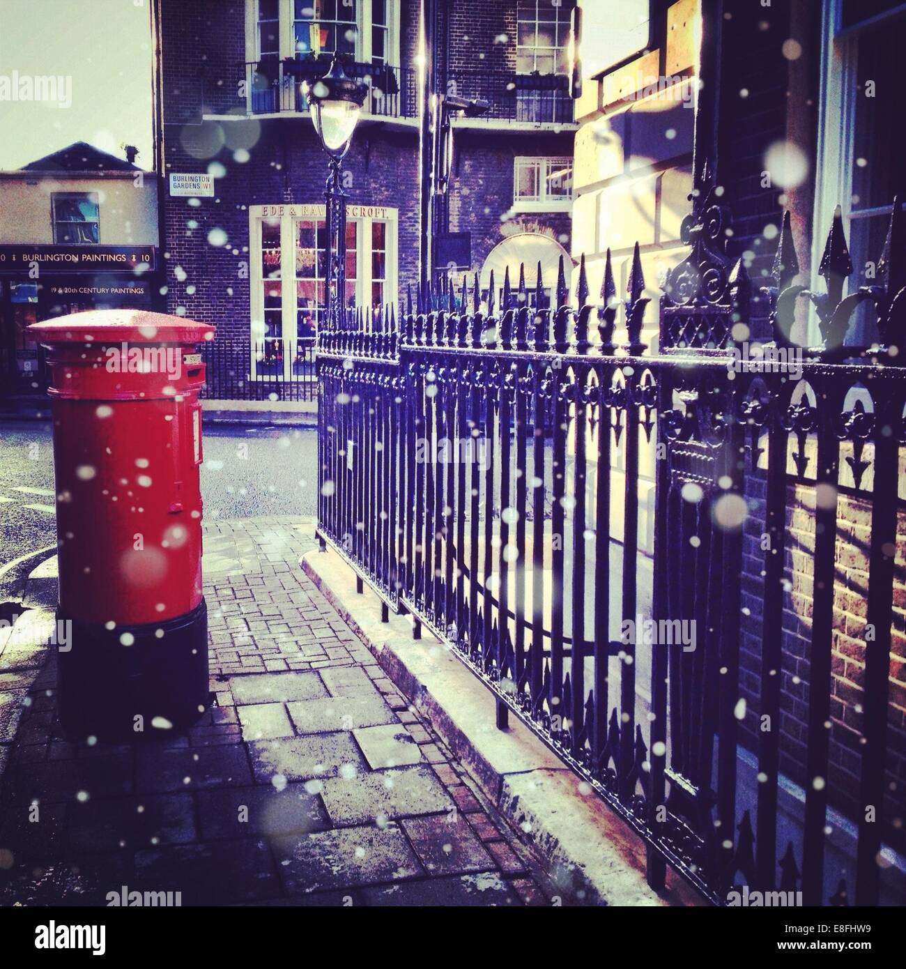 United Kingdom, London, Greater London, Post box and iron railing Stock Photo