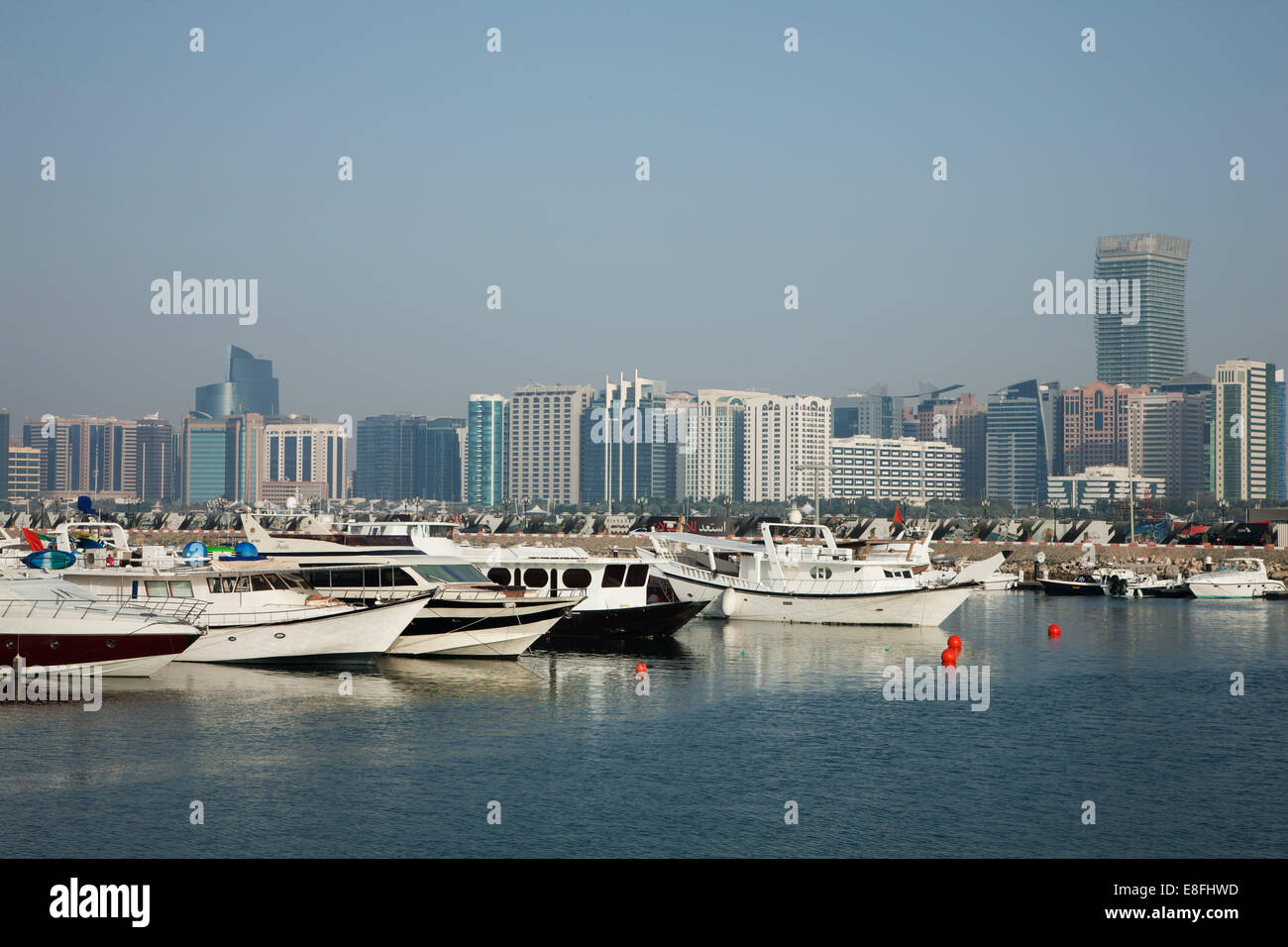Harbor and city skyline, Abu Dhabi, United Arab Emirates Stock Photo