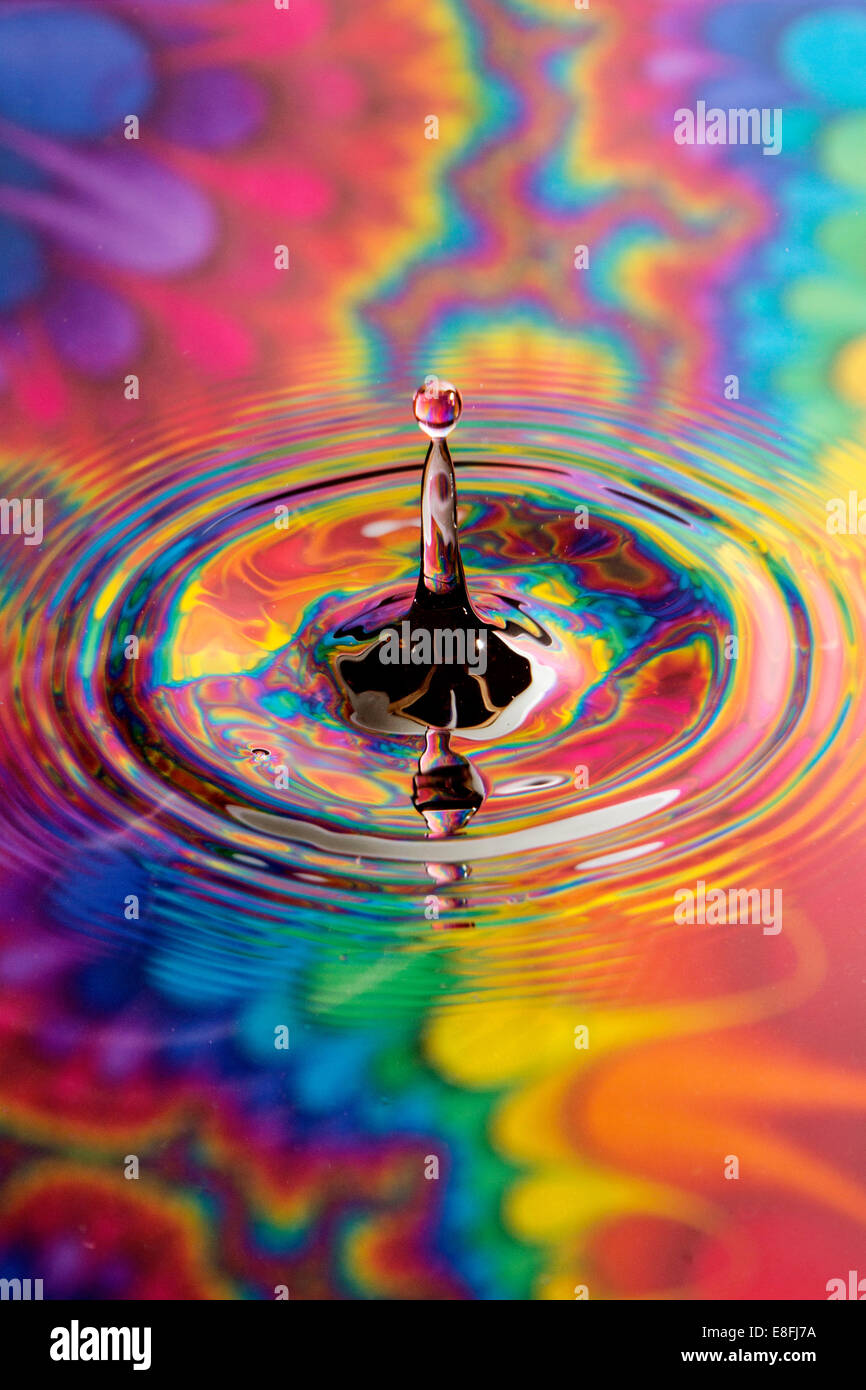 Water drop with colorful background Stock Photo