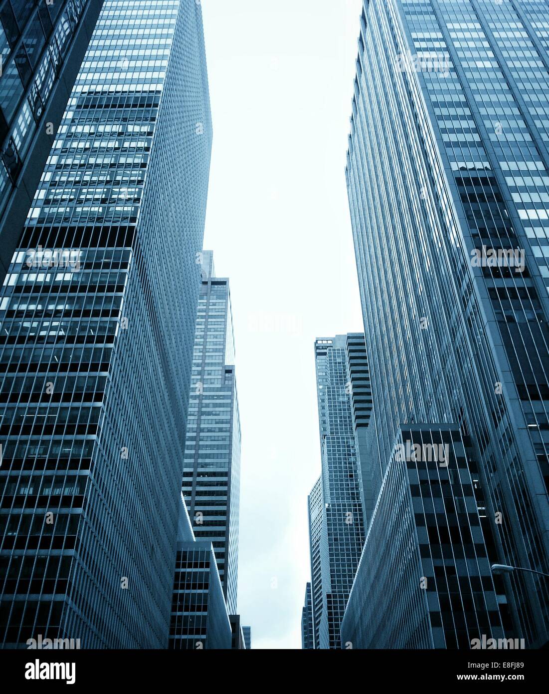 Low angle view of Skyscrapers, Midtown, Manhattan, New York, United States Stock Photo