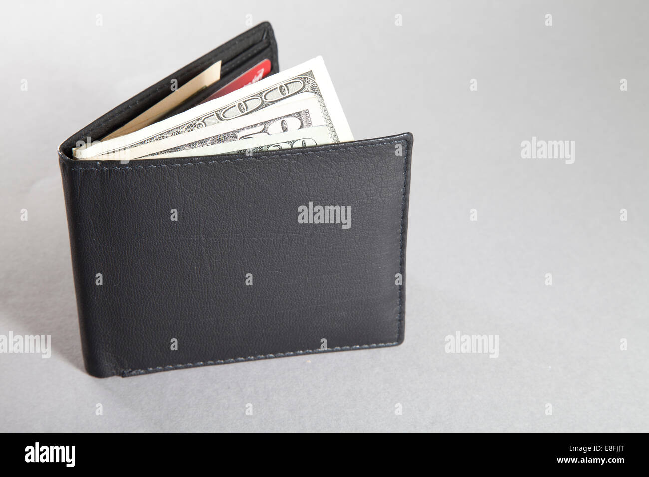 Wallet with US dollar bills Stock Photo