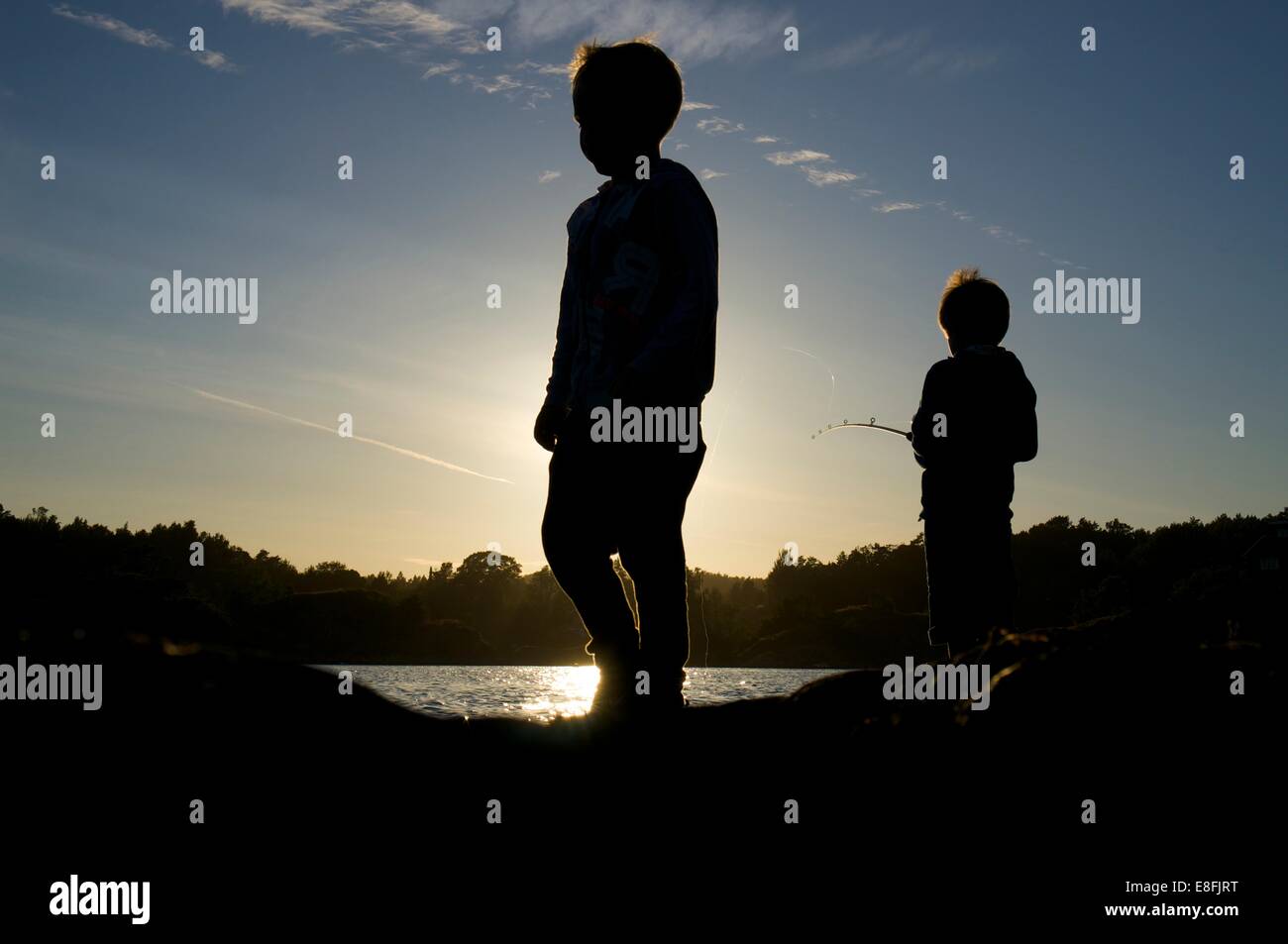 Two boys fishing hi-res stock photography and images - Alamy
