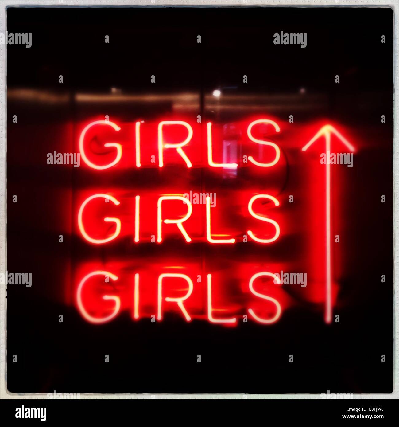 Netherlands, North Holland, Amsterdam, Orange neon 'girls' Stock Photo