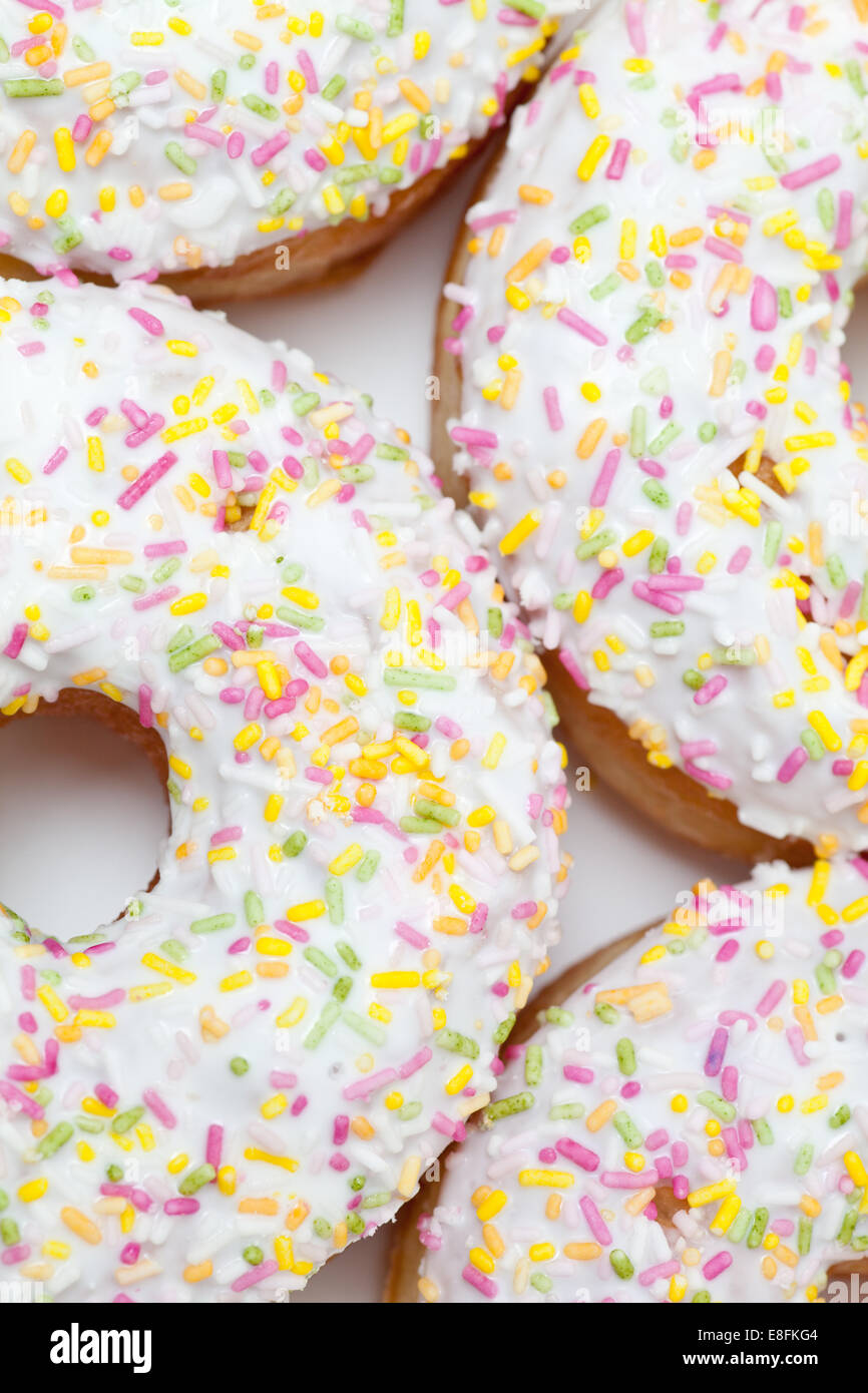 Close-up of Four iced doughnuts Stock Photo