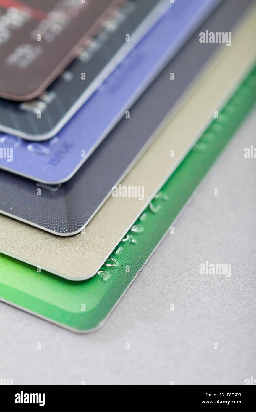 Close-Up of a stack of assorted Credit Cards on a table Stock Photo - Alamy