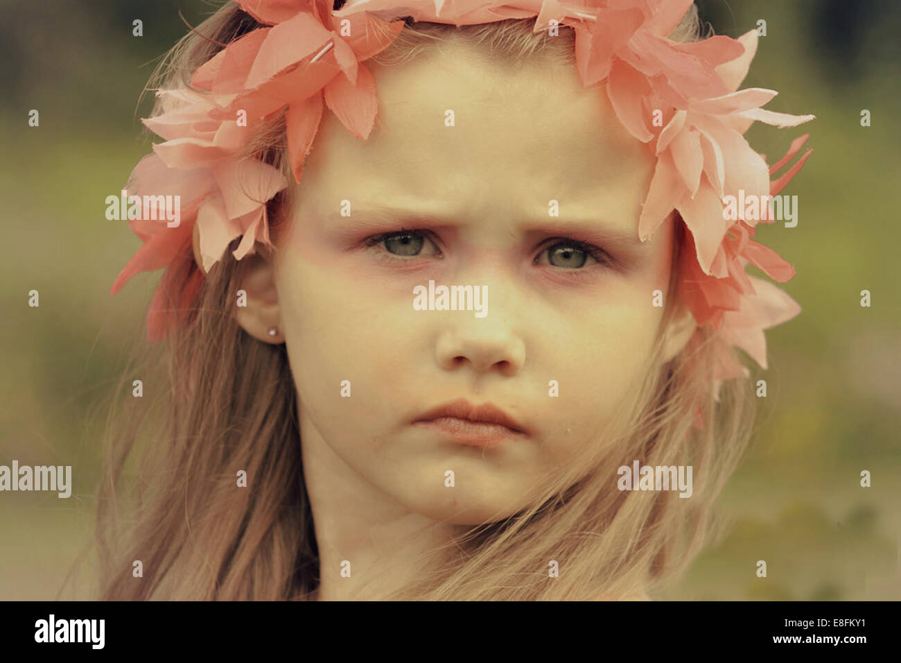 Portrait of a Girl wearing a pink floral headdress Stock Photo - Alamy
