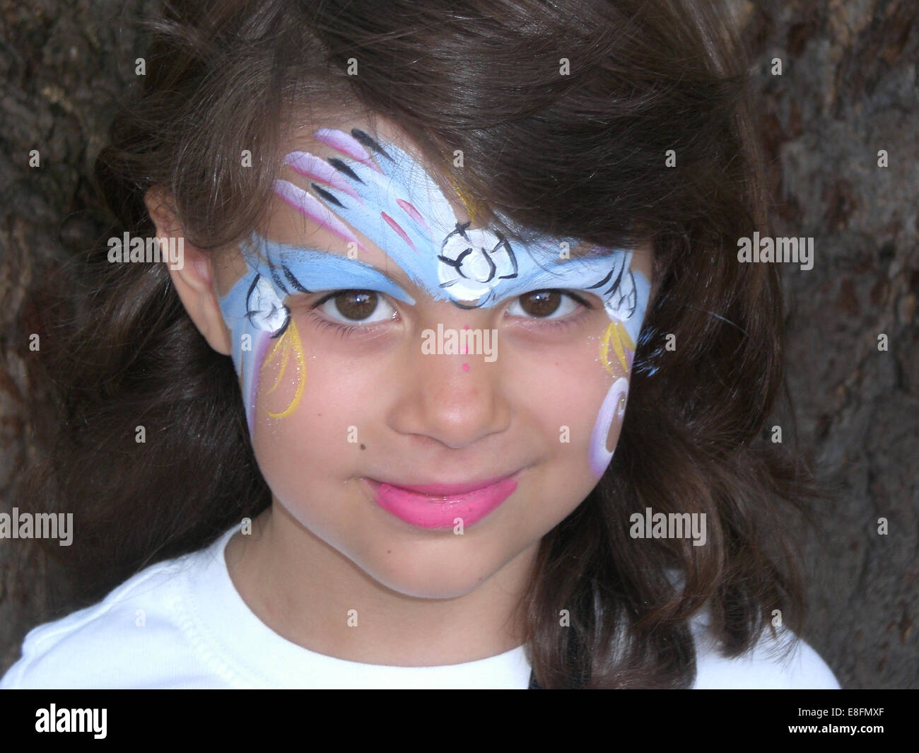 Girl (12-13) with face paint Stock Photo