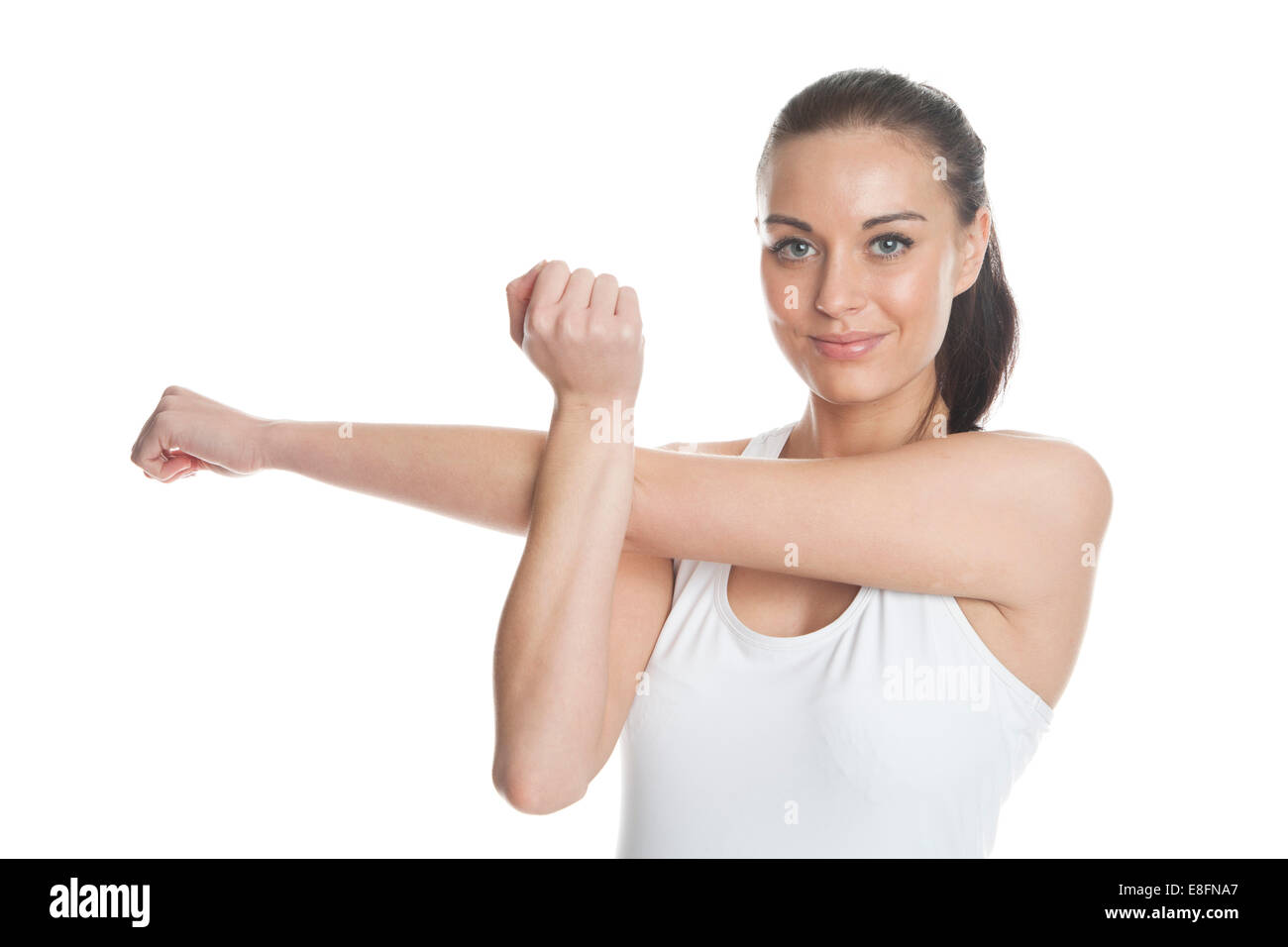 Young sportswoman stretching Stock Photo