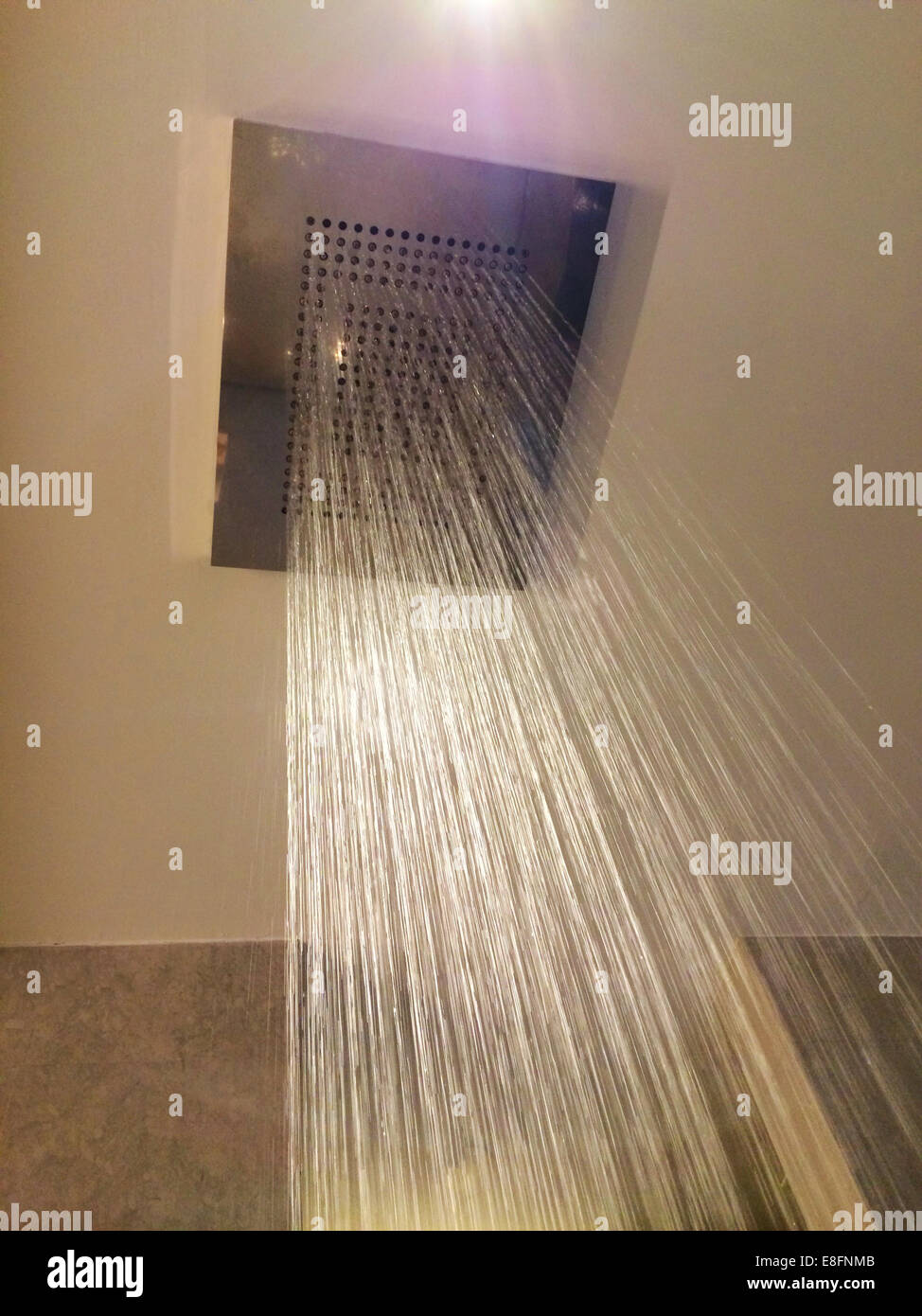 Low angle view of running shower Stock Photo - Alamy