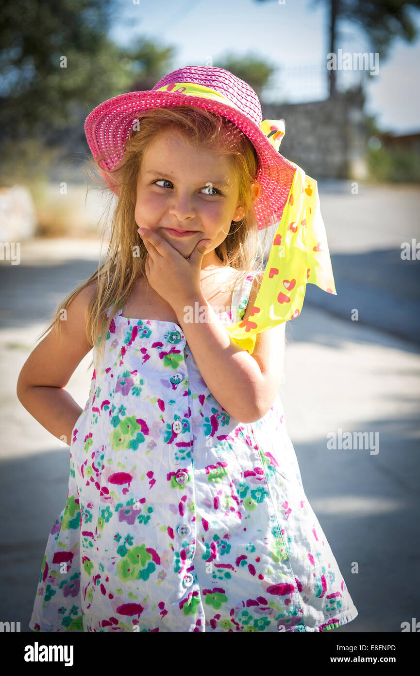 Front view of girl wearing summer hat Stock Photo