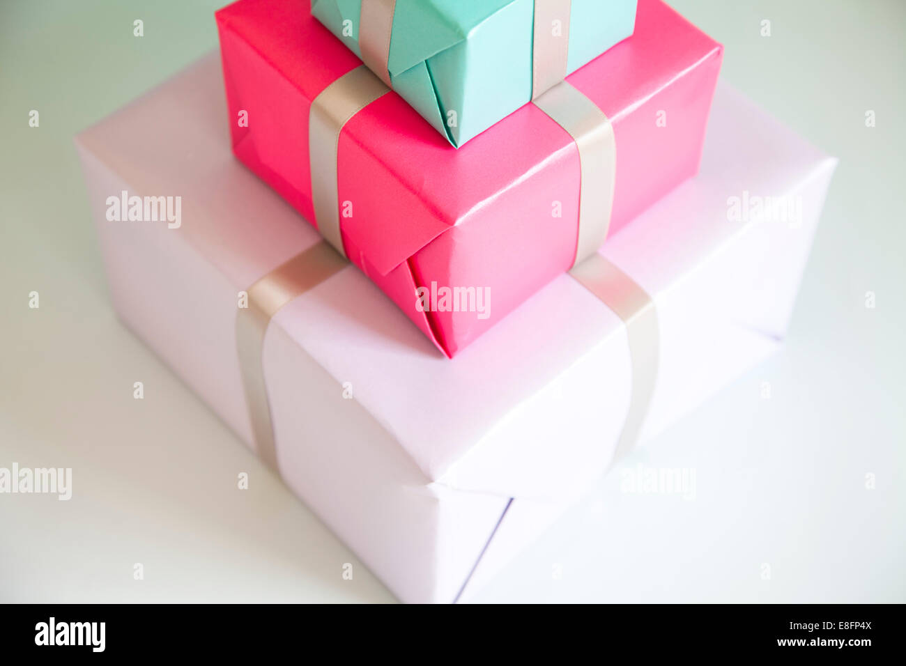 Close-up of a stack of Three wrapped gifts Stock Photo