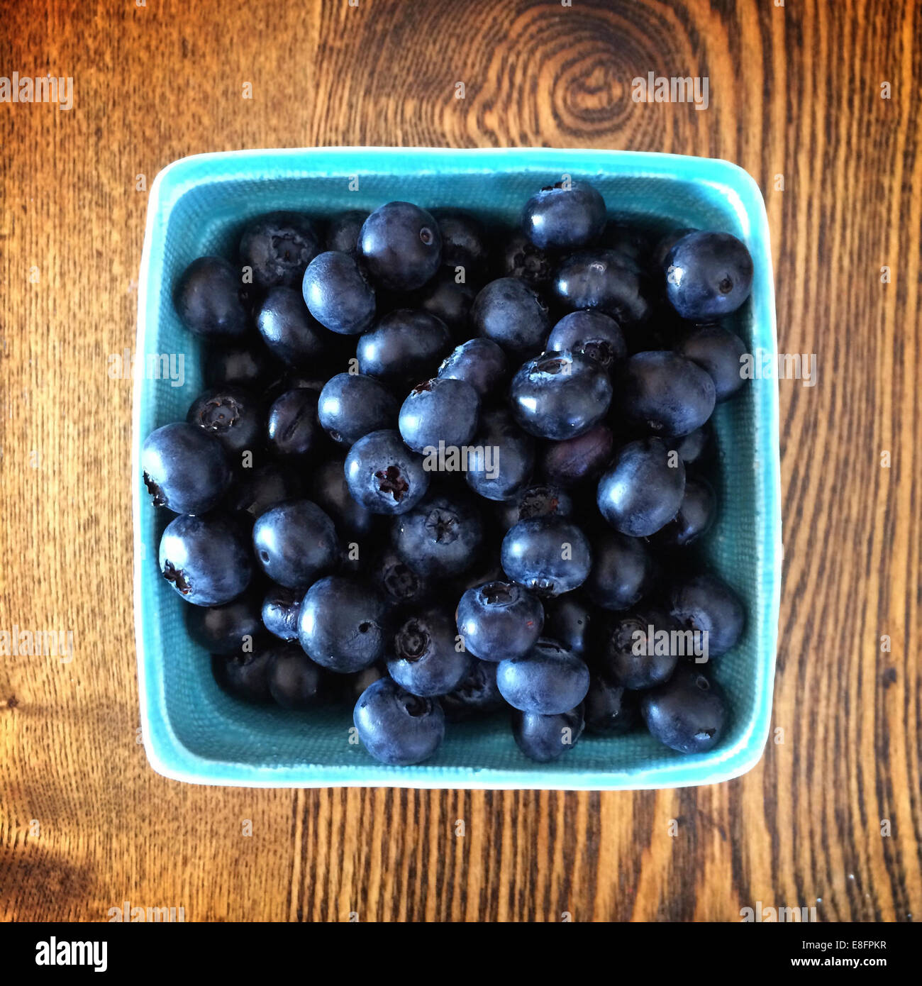 Overhead view of Box of blueberries Stock Photo