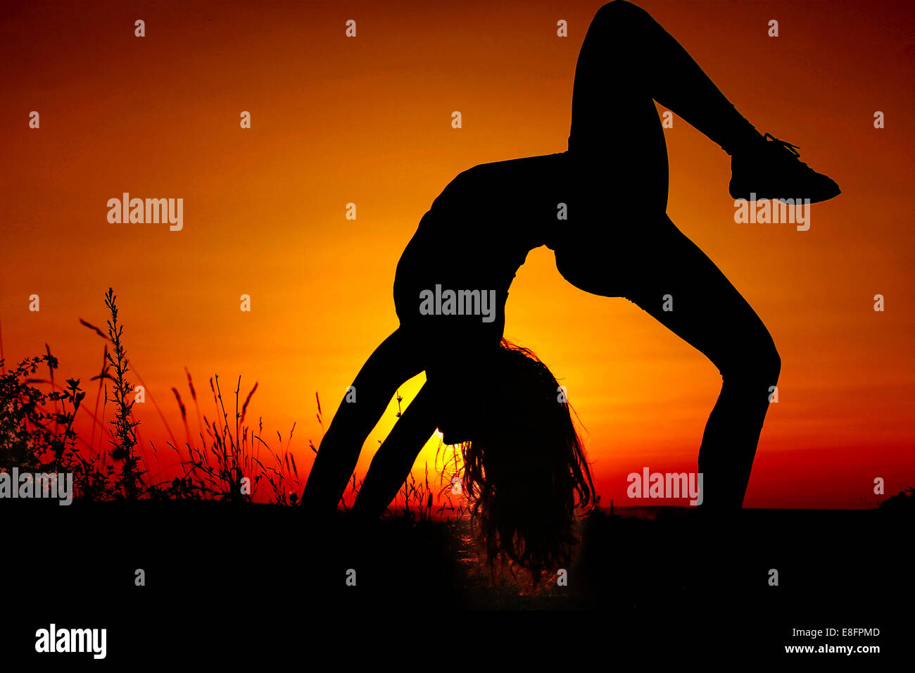 Girl (11-12) doing gymnastics Stock Photo