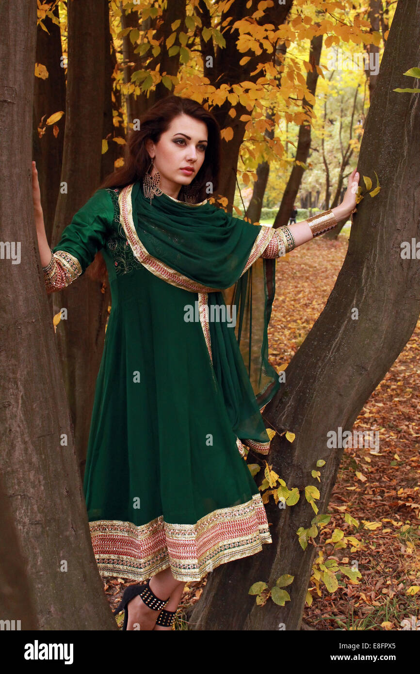 Picture of young woman in park Stock Photo