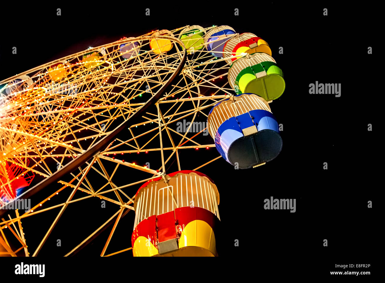 Australia, Sydney, Low angle view of Ferris Wheel At Night in Luna Park Stock Photo