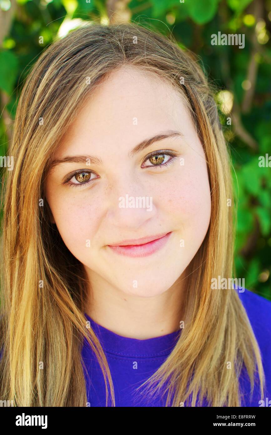Portrait of girl (12-13) smiling Stock Photo