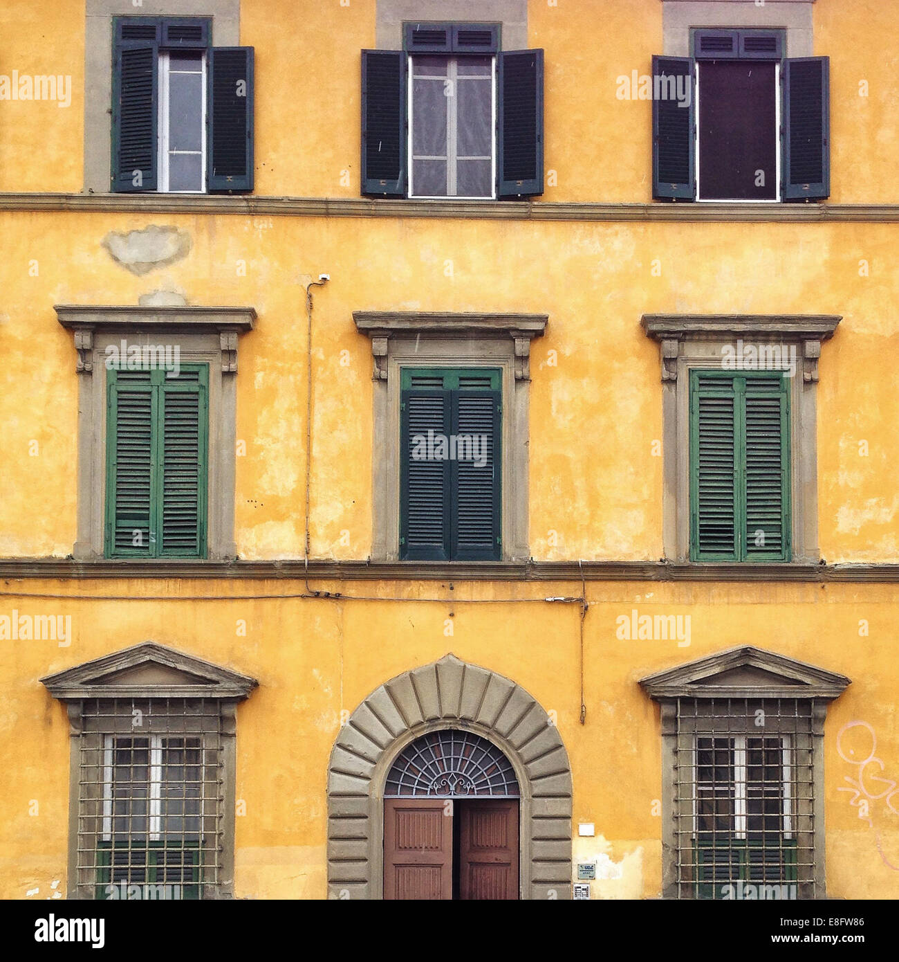 Italy, Tuscany, Pisa, Yellow house Stock Photo