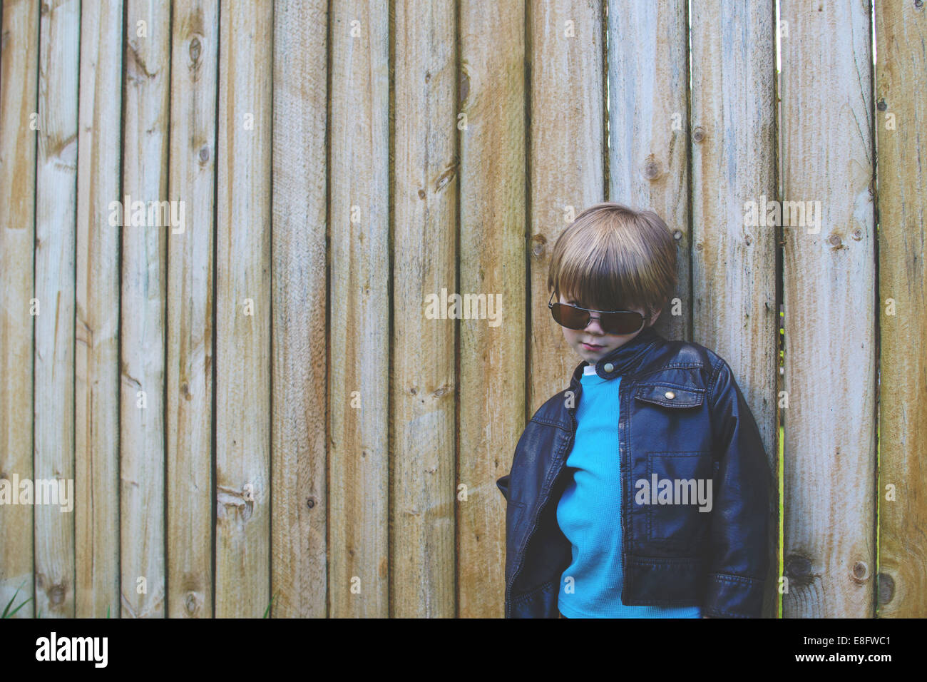 Portrait of a boy dressed up as a cool dude Stock Photo