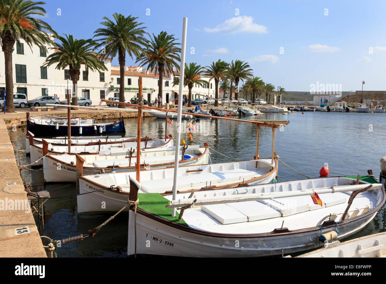 Small harbour at Fornelis with traditional Spanish styled fishing boats, Menorca, Spain Stock Photo