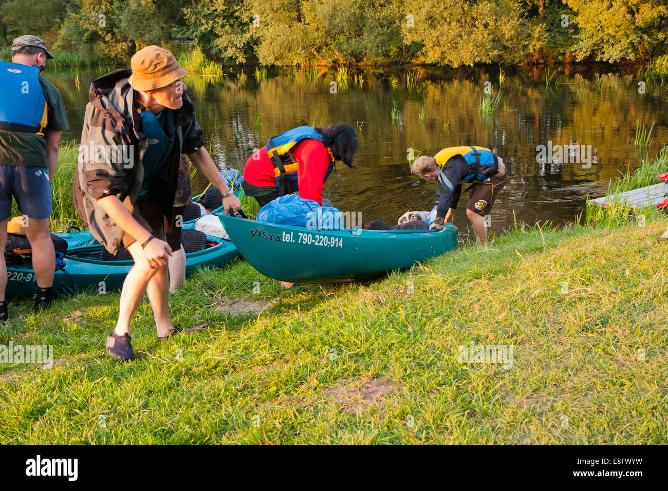 A group of young kayakers. Bystrzyca river Kayaking expedition. Poland. Stock Photo
