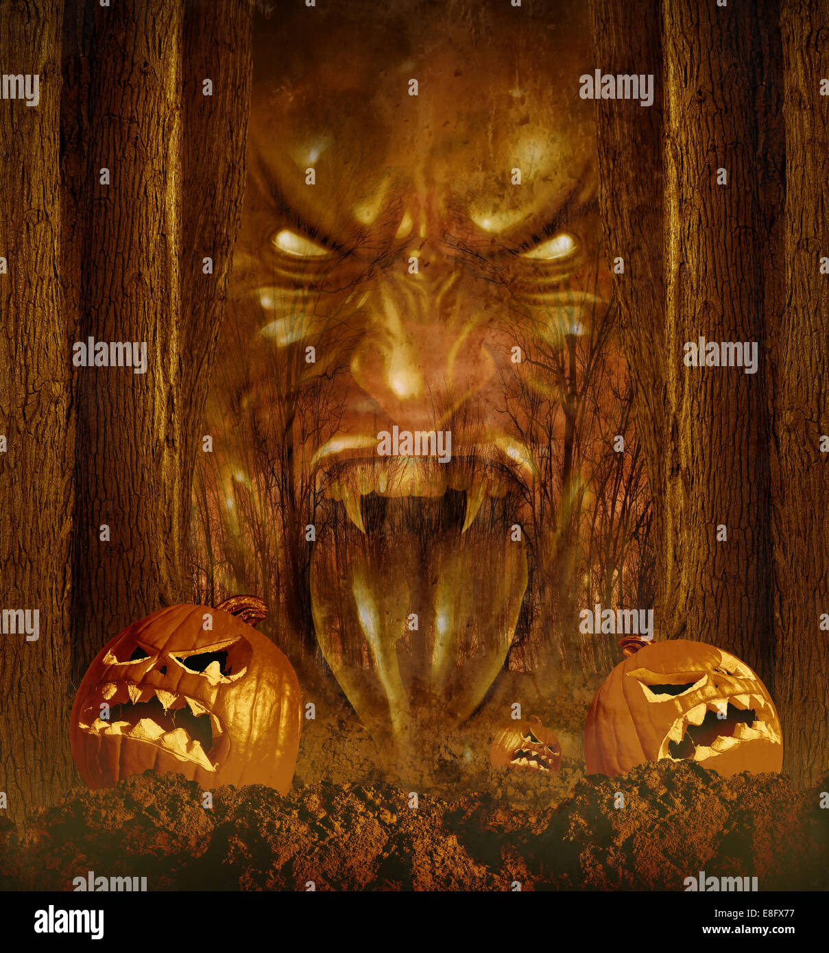Halloween ghost concept as a creepy scary phantom appearing through a dark haunted forest with jack o lantern pumpkins on an autumn night . Stock Photo