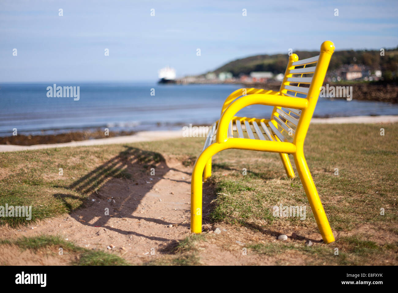 Yellow bench Brodick Isle of Arran, Scotland Stock Photo