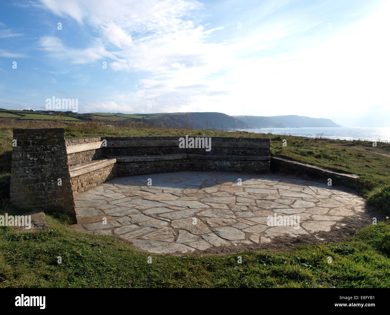Public seating area on the cliff top between the beaches of Widemouth Bay and Black Rock near Bude, Cornwall, UK Stock Photo