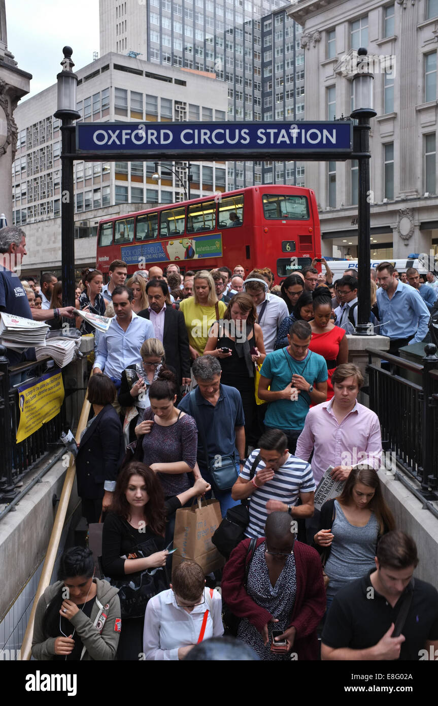 People entering Oxford Circus Underground  Station. Stock Photo