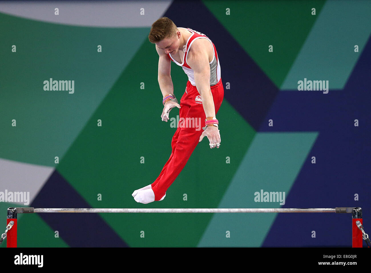 Nile Wilson (ENG) is pleased with his performance on the horizontal bar. Artistic Gymnastics- Men's All Round Final - The SSE Hy Stock Photo