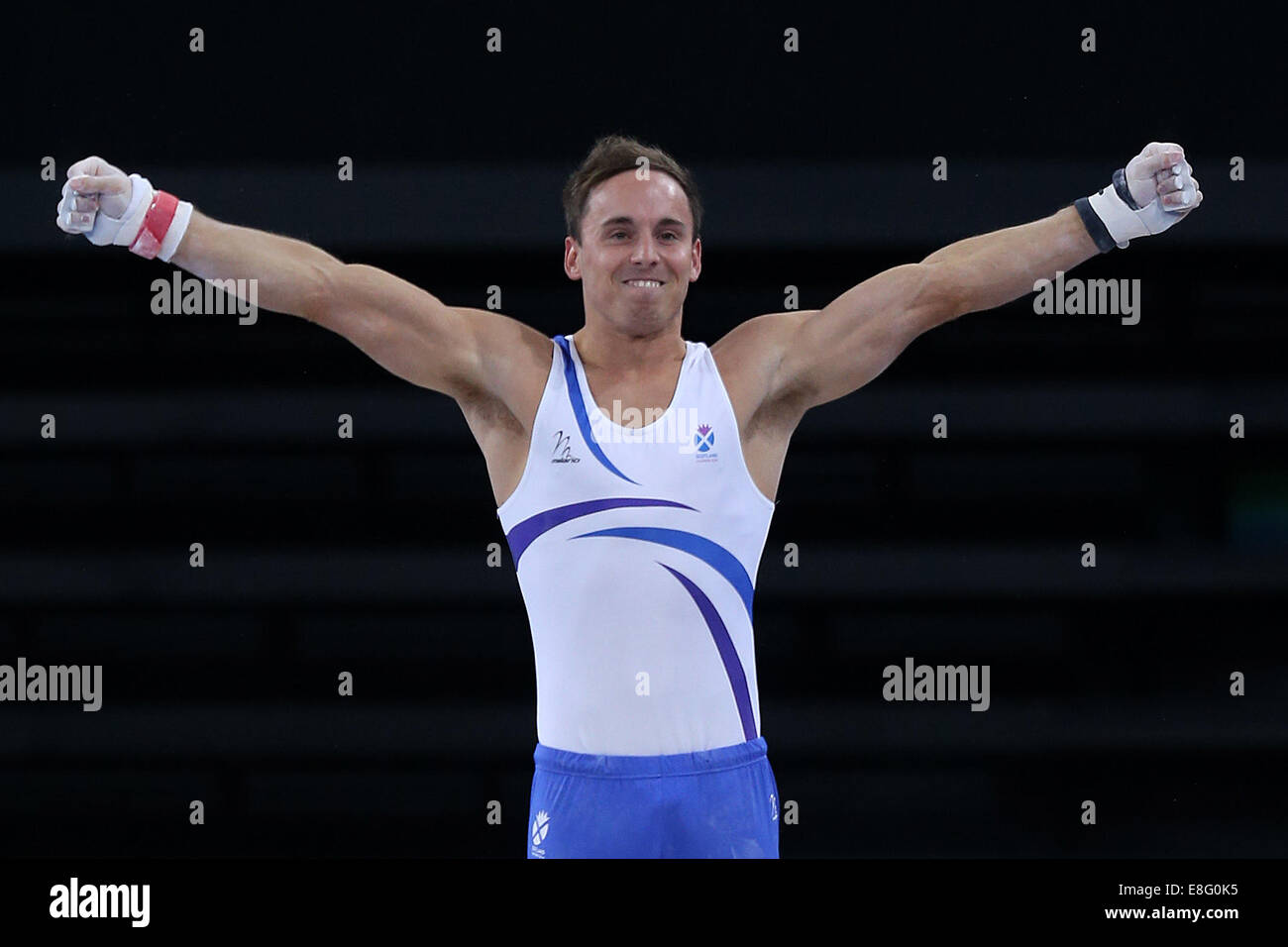 Daniel Keatings (SCO) is pleased with his performance on the horizontal bar. Artistic Gymnastics- Men's All Round Final - The SS Stock Photo