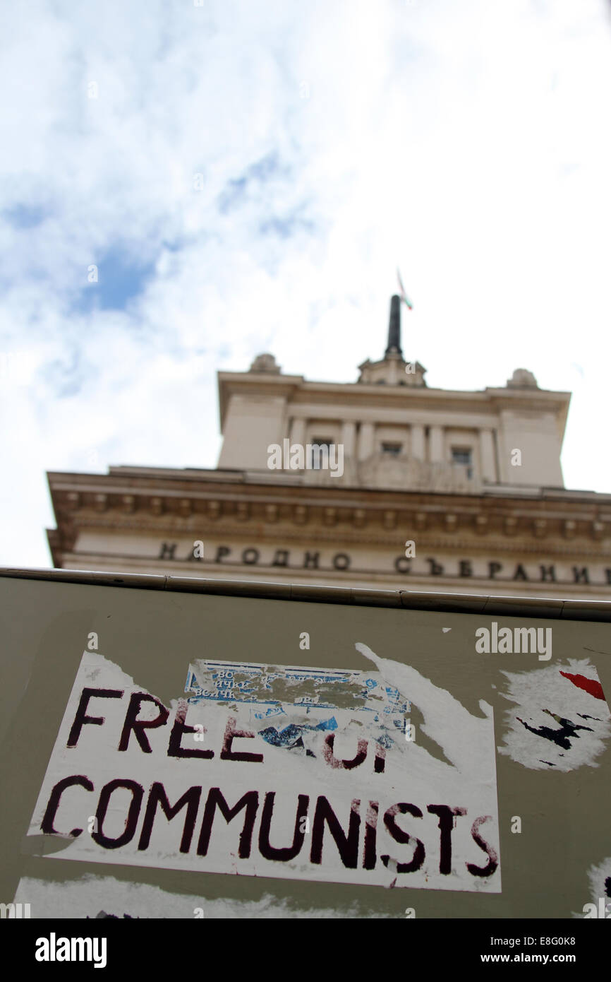 A poster saying 'free of communists' outside the former Bulgarian Communist Party headquarters in Sofia, Bulgaria Stock Photo