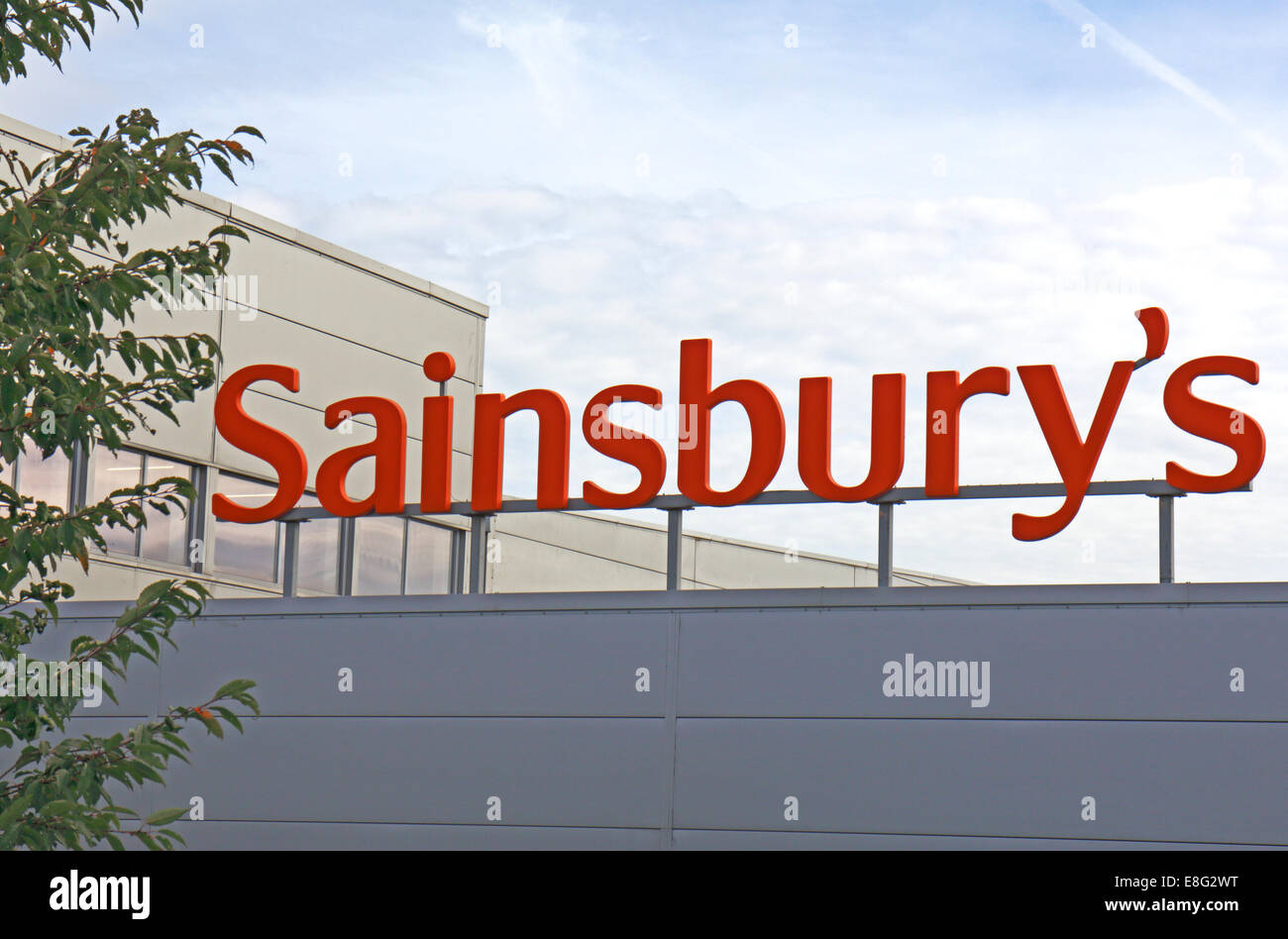 A store sign outside a Sainsbury's supermarket at Costessey, Norfolk, England, United Kingdom. Stock Photo