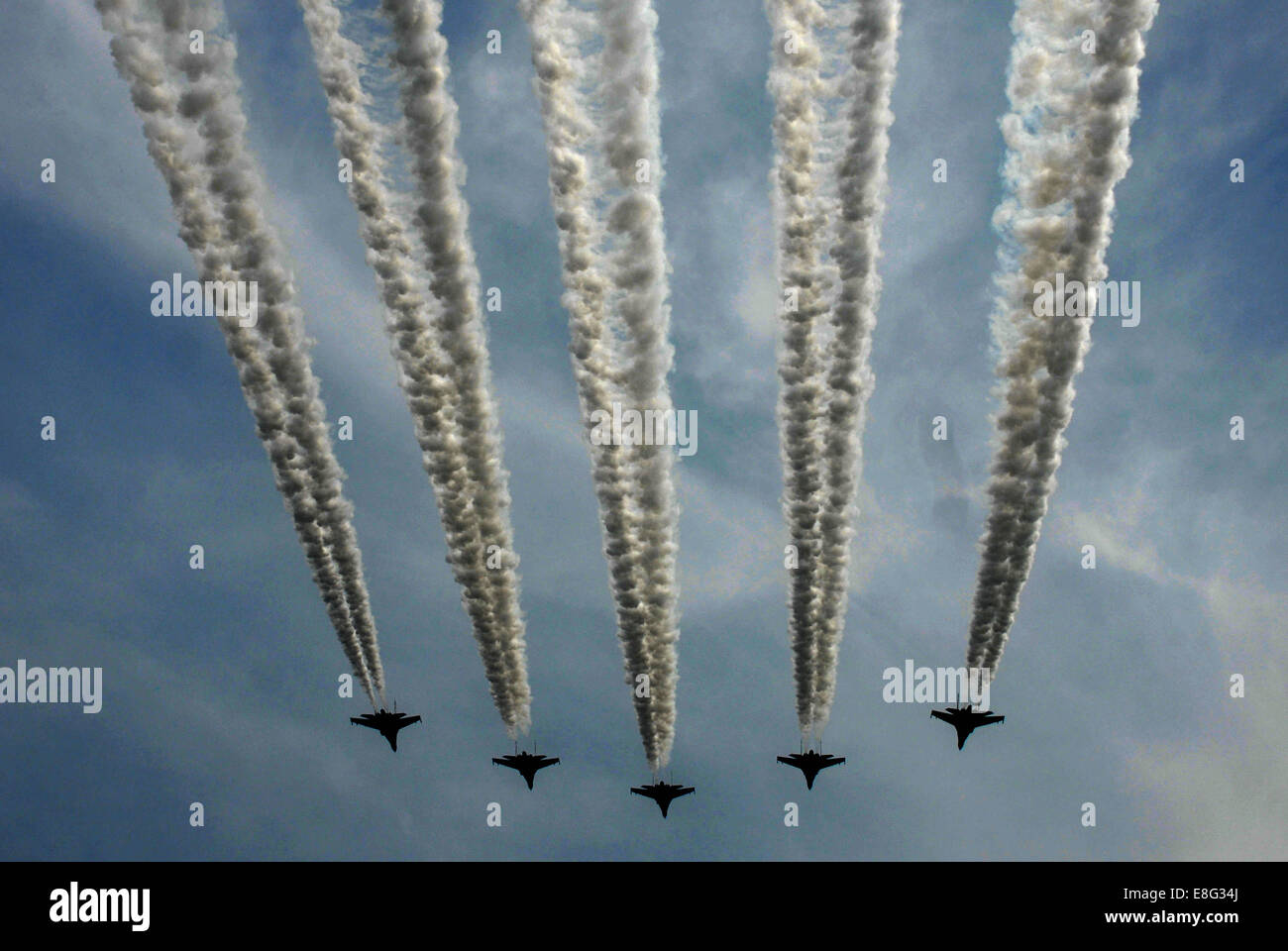 Surabaya, East Java. 7th Oct, 2014. Warplanes attend the celebration of the 69th anniversary of the Indonesian Armed Forces in Surabaya, East Java, Oct. 7, 2014. Credit:  Syaiful Arif/Xinhua/Alamy Live News Stock Photo