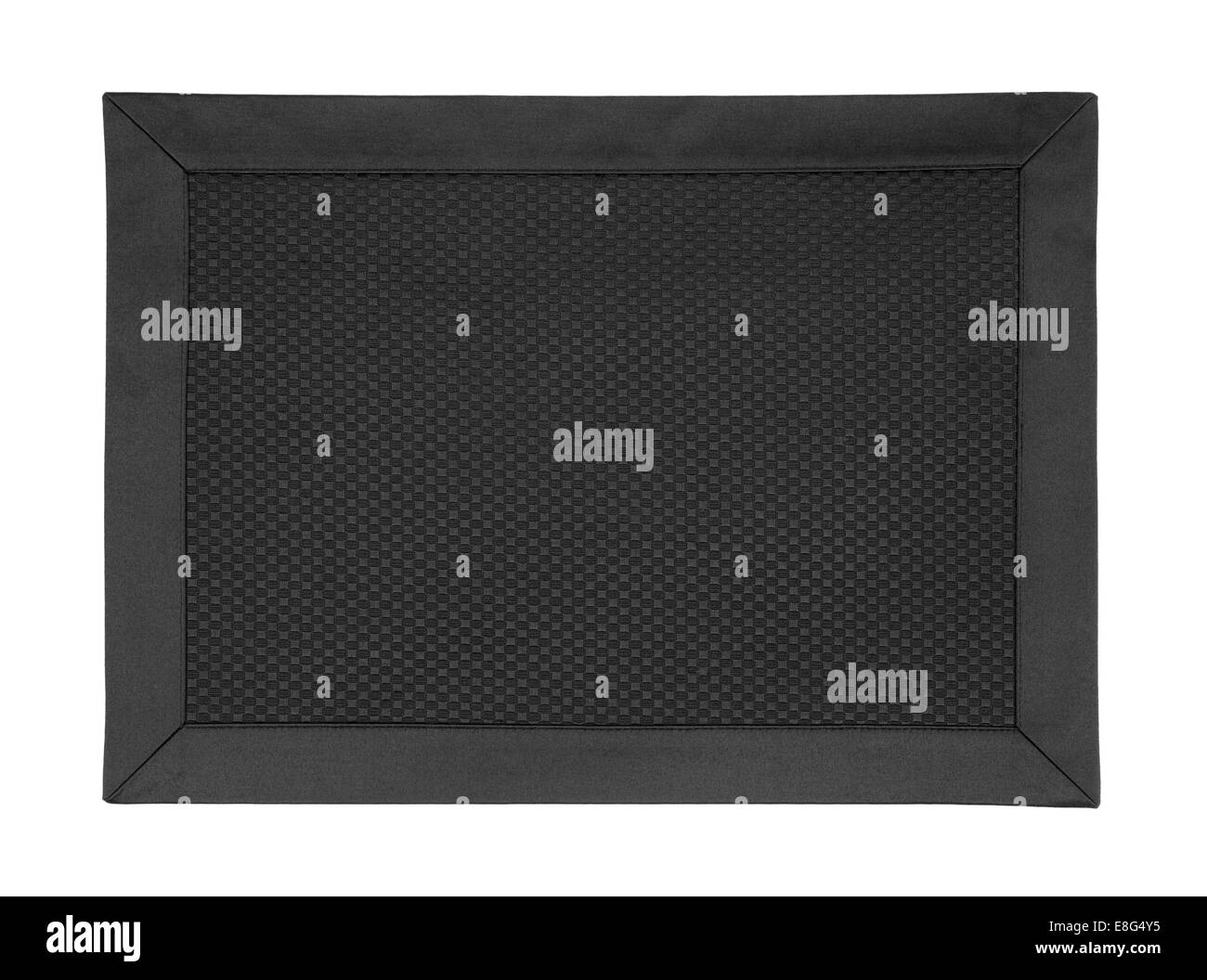 A black cloth place mat on a white background. Stock Photo