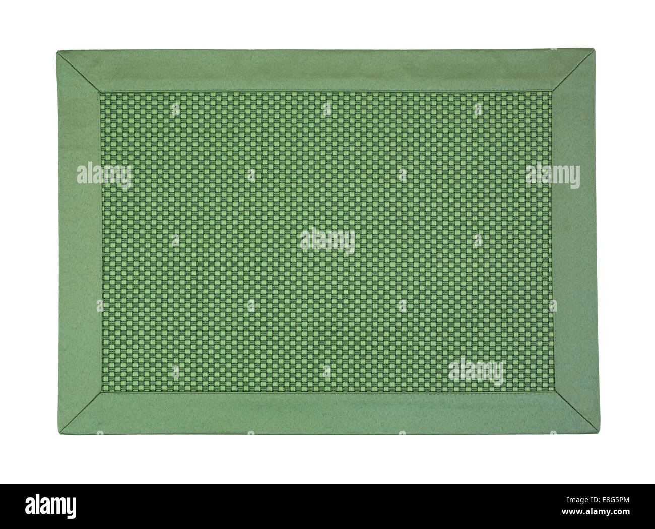 A green cloth place mat on a white background. Stock Photo