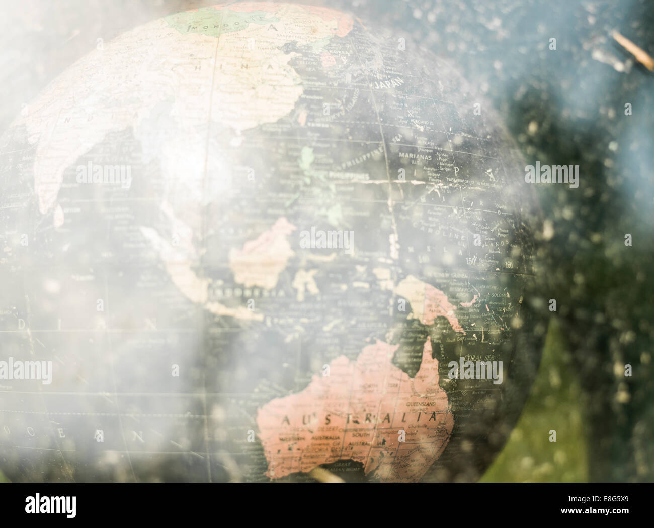 A globe behind glass showing the eastern world. Stock Photo