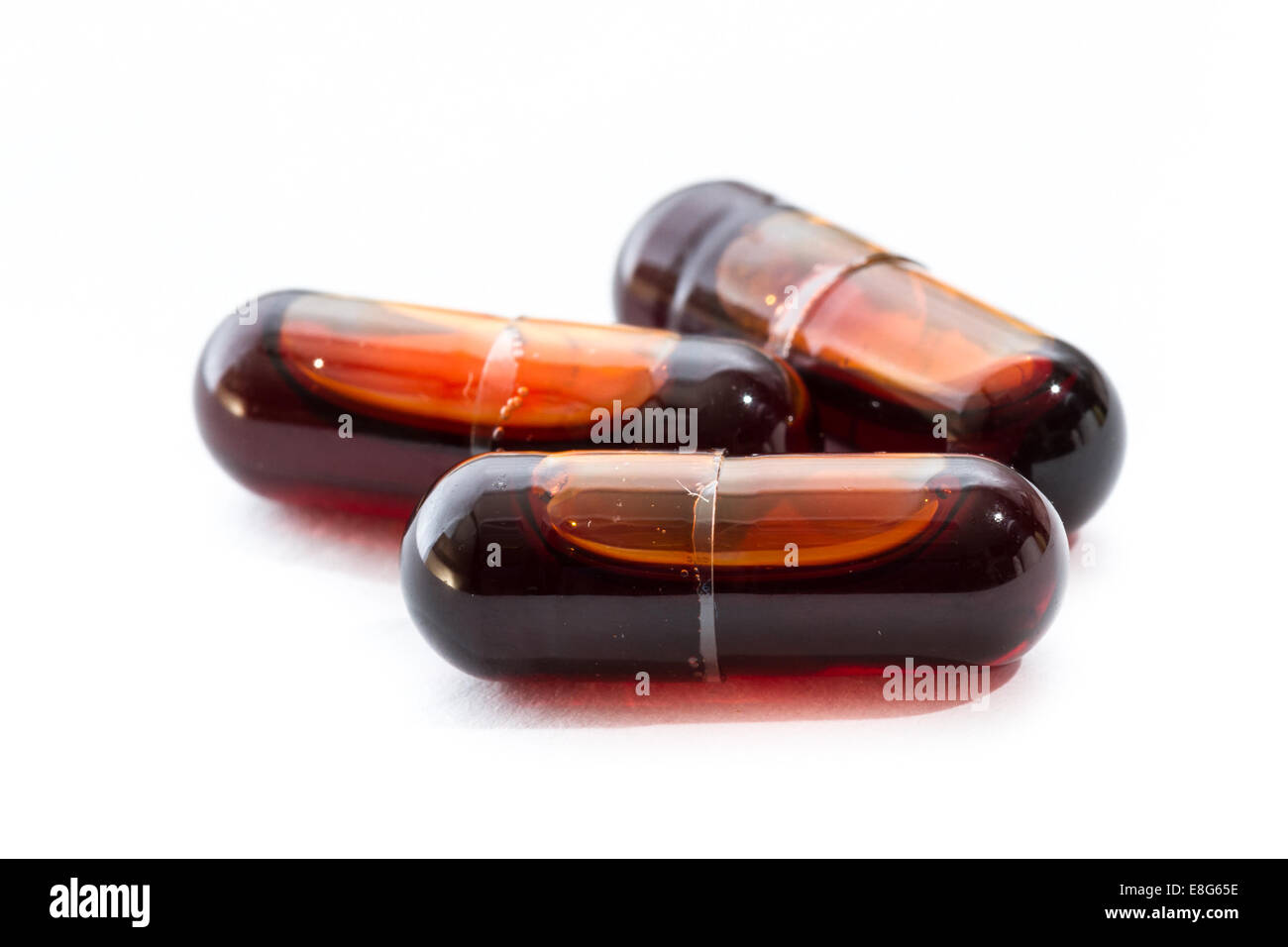 close up of krill oil capsules isolated on a white background Stock Photo