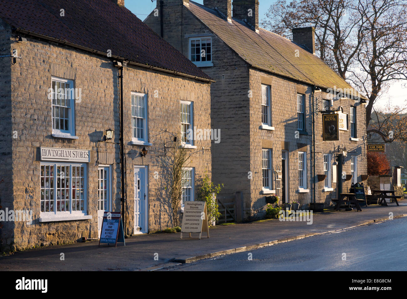 Hovingham village store and the Malt Shovel Inn, North Yorkshire, England Stock Photo