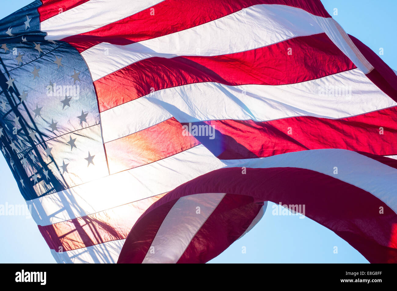 United States flag flying from a fire truck ladder in Barnstable, Massachusetts, USA. Stock Photo